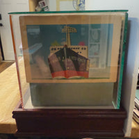 1966 Hess Voyager ship with The Box and display case. Original packing paper included.